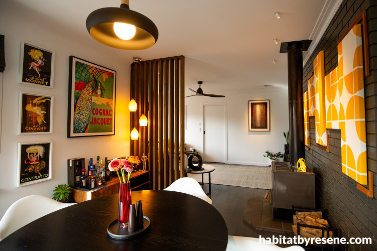 Living and dining area featuring walls and ceiling in Resene Alabaster, brick wall in Grey Friars