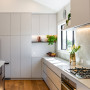 Kitchen with cabinets in Resene Quarter Rice Cake