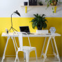 Home office with white upper wall and yellow lower wall
