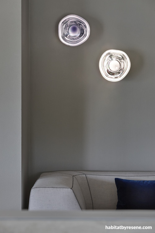 A corner of a room featuring art and Resene Ash