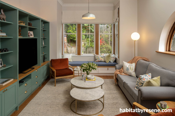 The living room joinery features the gorgeous green-blue of Resene Cutty Sark, with Resene White Pointer painted on surrounding walls.  