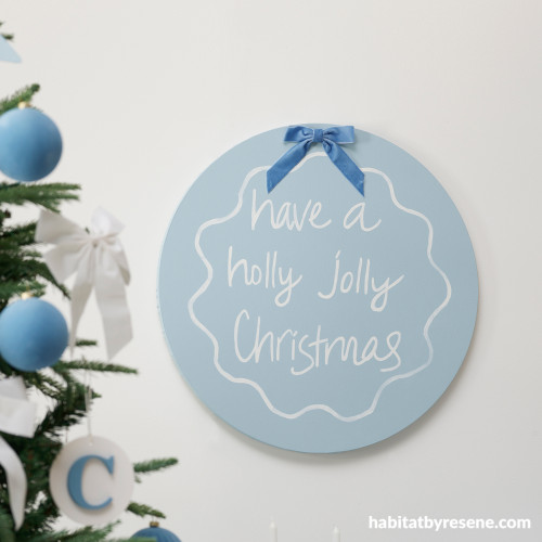 Christmas artwork painted in Resene Halcyon and Half Rice Cake