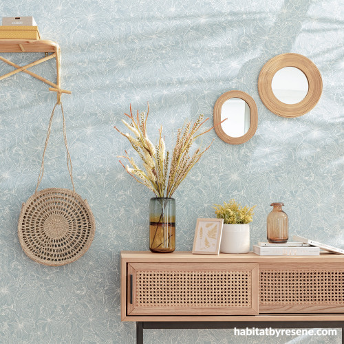 Hallway featuring a gentle blue printed wallpaper