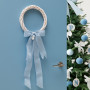Light blue front door and Christmas wreath