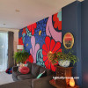 Floral mural featuring painted in red, purple, pink and blue colours