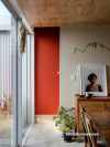 Morccoan-inspired entrance painted in Resene Red Red Red and wall in Resene Merino