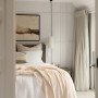 Bedroom with feature wall in Resene White Pointer
