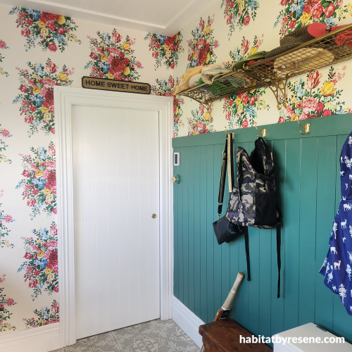 Entryway featuring floral wallpaper
