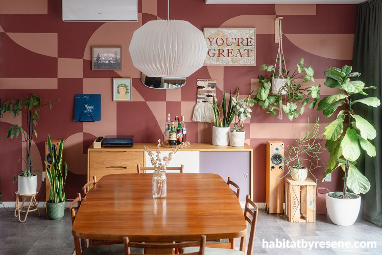 Dining room with mural painted in Resene Summer Rose and Savour