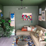 Living room with walls and ceiling in turtle green