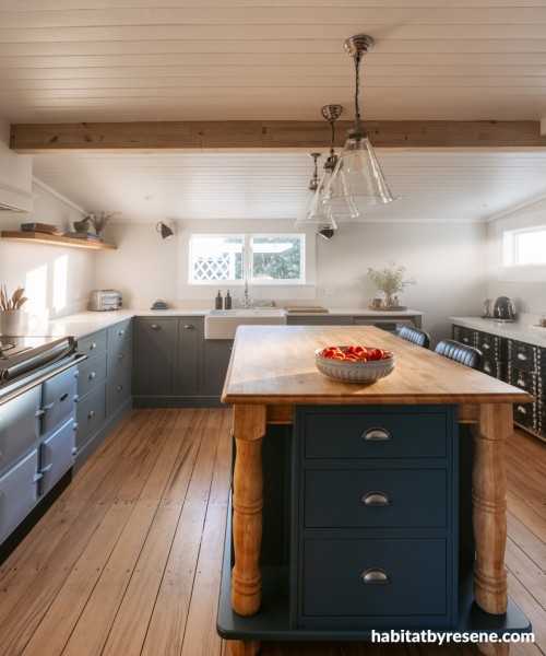Kitchen featuring cabinetry painted in Resene Rolling Stone and kitchen island in Resene Big Stone