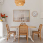 Neutral dining room featuring walls painted in Resene Wan White