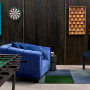 Man cave or games room featuring timber wall panels stained in Resene Colour Enhance Japan Black
