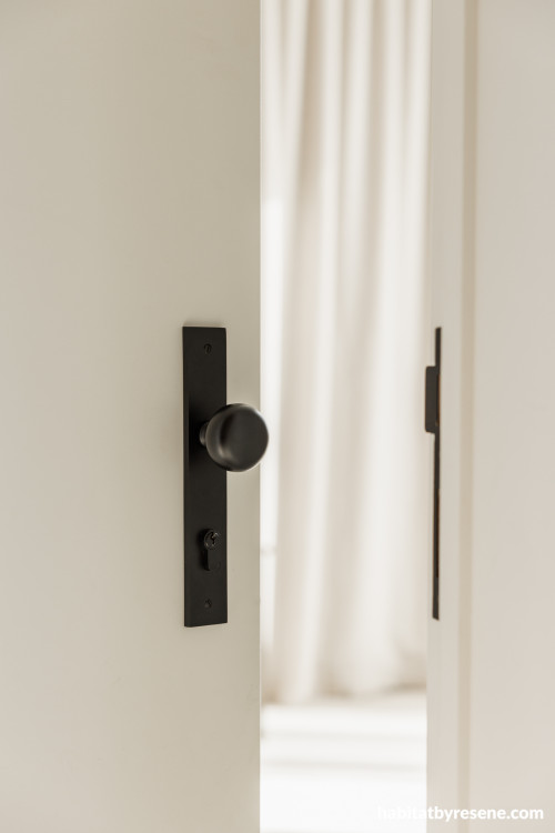 Internal door painted in Resene Half Wan White