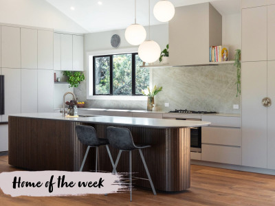 Warm neutrals and blush hues bring this Oratia home to life