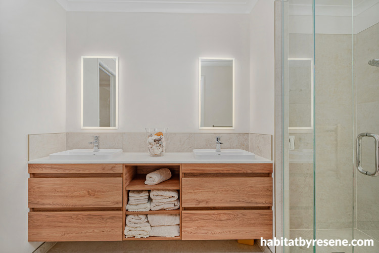 Bathroom painted in Resene Quarter Sandspit Brown and featuring a timber vanity