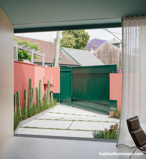 Exterior patio and garden featuring Resene Japonica and Resene Zuccini