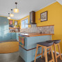 Kitchen featuring Spanish-inspired hues including Resene Bright Spark