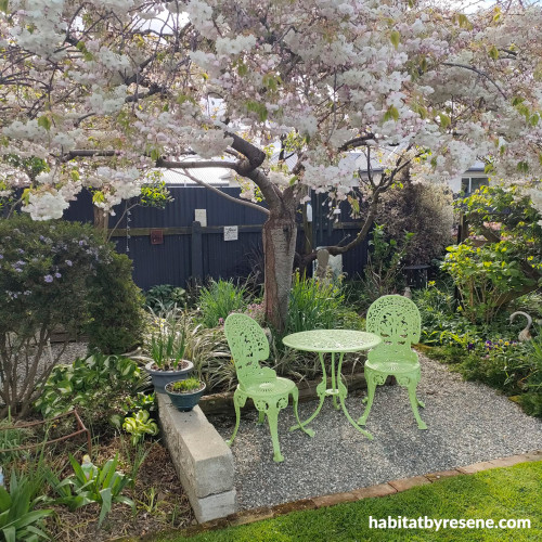 Outdoor table and chairs painted in Resene Sublime