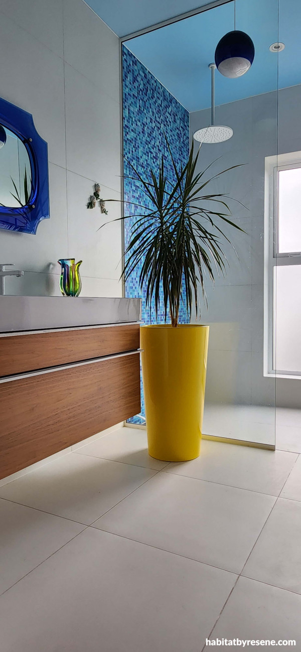 A refreshing and calming space. The ceiling of this bathroom is painted in Resene Sail, a soft, breezy blue.  