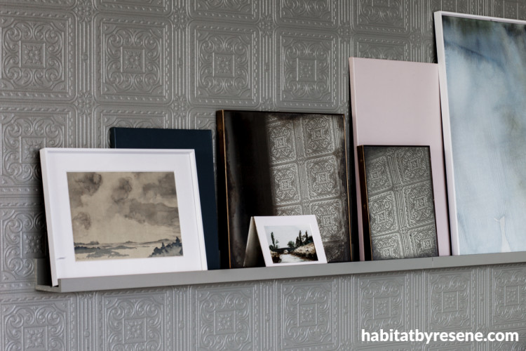 Wall with shelving featuring textured Resene wallpaper