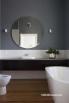 grey bathroom, resene raven, round mirror, white subway tiles, matai, timber floors