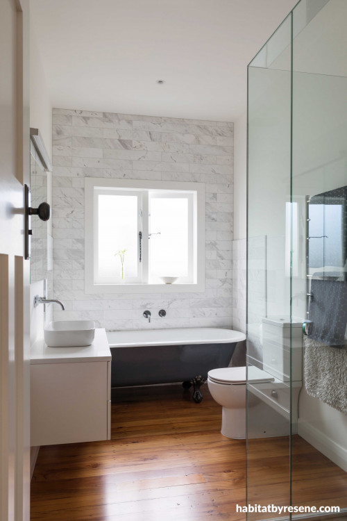 bathroom, white bathroom, neutral bathroom, renovated bungalow, clawfoot bath, bathroom feature wall