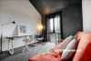 study nook, lounge, black and white study, black and white office, black feature wall, orange