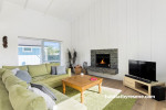 living room, lounge, white living room, paneled walls paneled ceiling, fireplace, white interior 