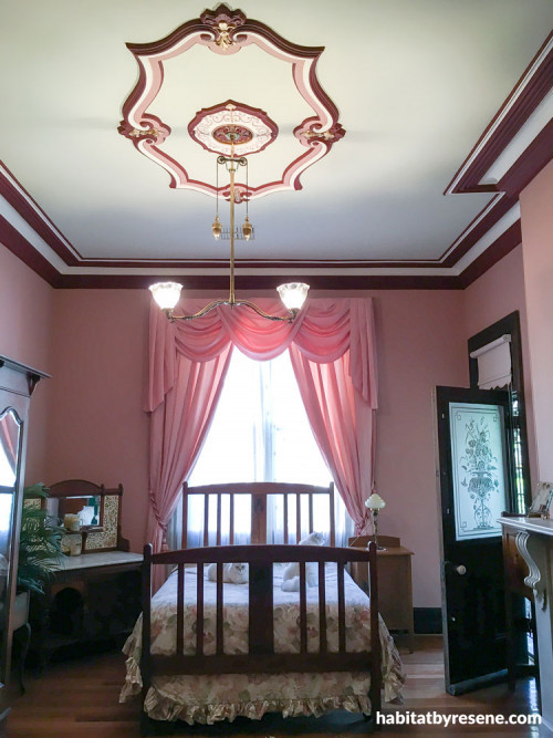 bedroom, pink bedroom, pink and red paint, ceiling rose, metallic gold, ceiling