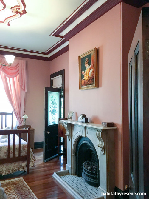 bedroom, red bedroom, fireplace, rose paint, pink bedroom
