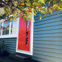 exterior cladding, weatherboard Inspo, red door, red door inspiration, White window frames, Resene