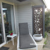 outdoor living, house exterior, grey exterior, grey house, deck, resene delta, grey weatherboards