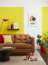 yellow lounge, yellow living room, yellow feature wall, resene turbo, yellow interior