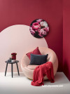 reading nook, red and pink, red wall, pink chair, feature wall, painted circle, circle wall